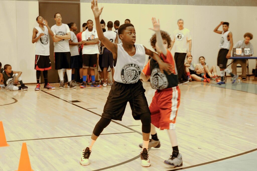 Youth playing basketball